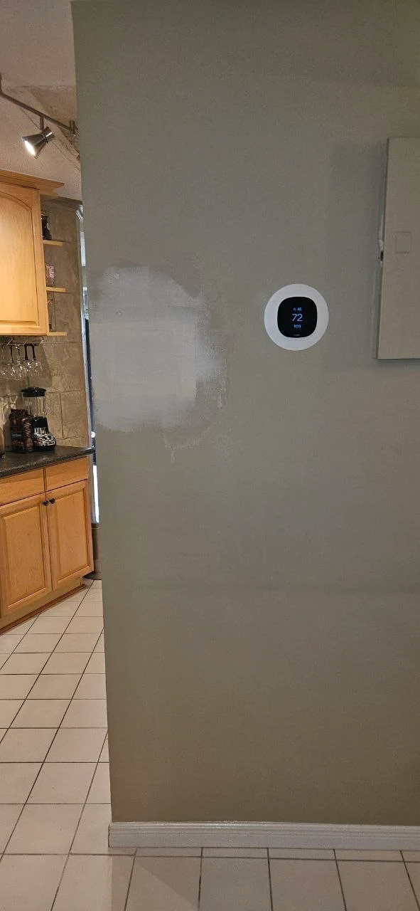 Drywall damage left by previous painter — Windsor rental unit